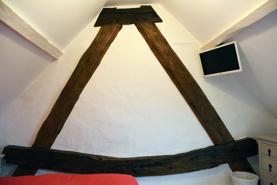 cruck frame in attic room